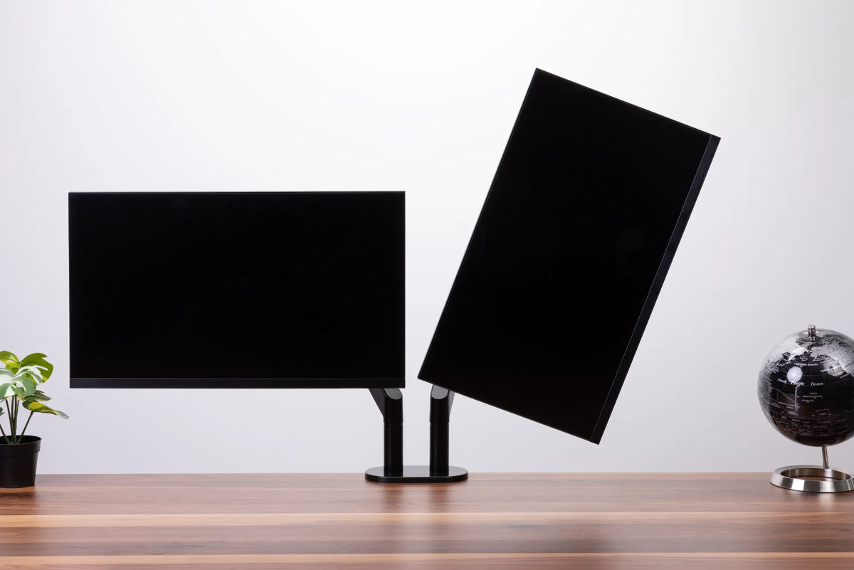 One landscape monitor and one portrait monitor mounted side by side on a dual arm