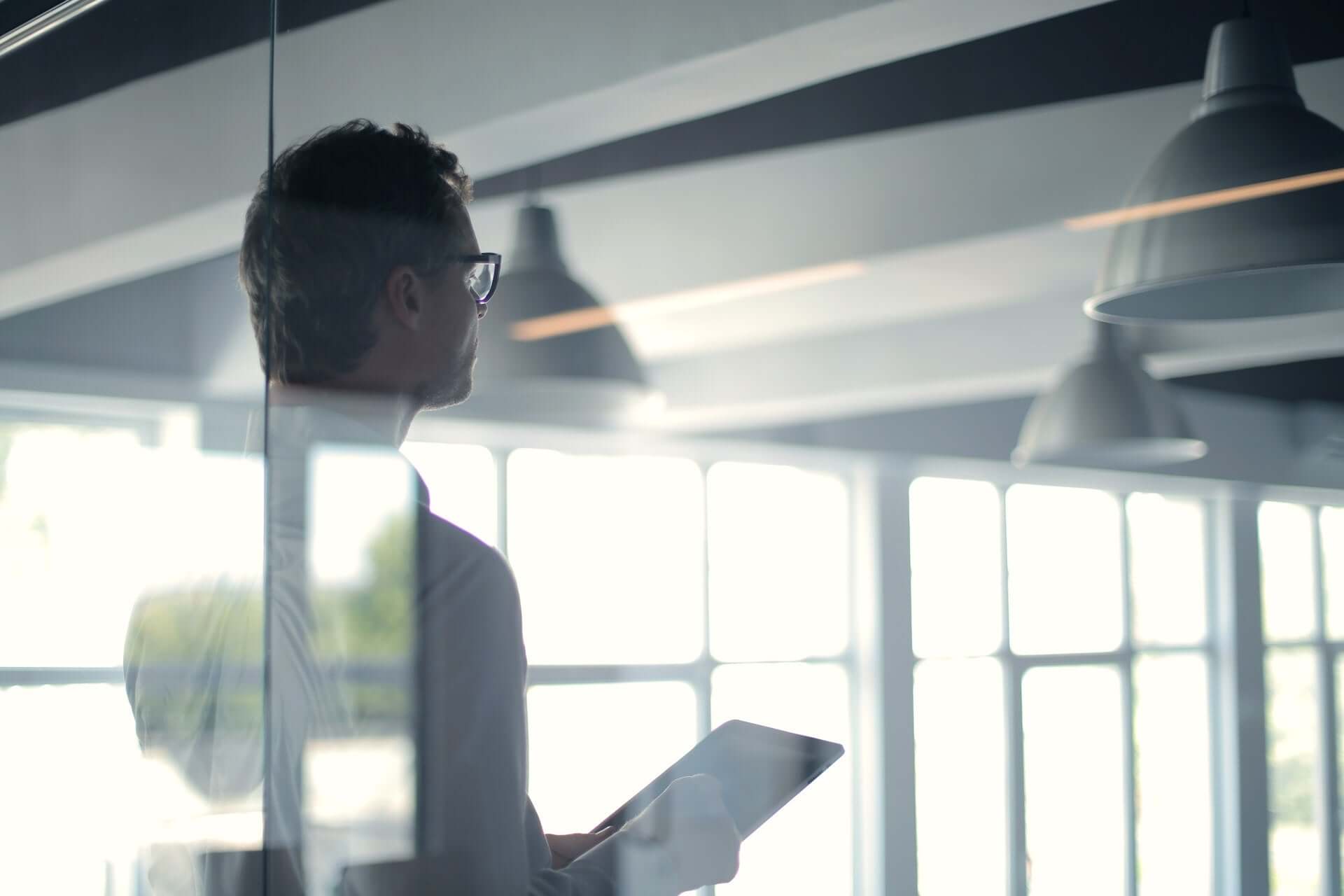 Bright office workspace illuminated by natural light from a nearby window