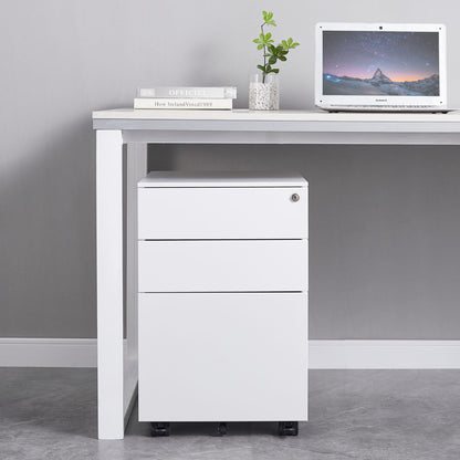 White office desk with a filing cabinet against a gray wall.