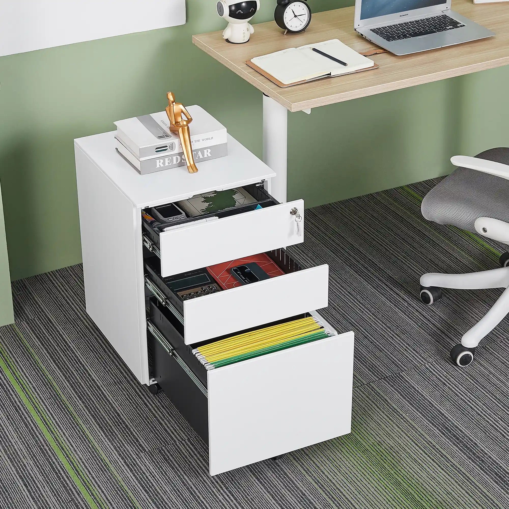 White filing cabinet with open drawers in an office setting