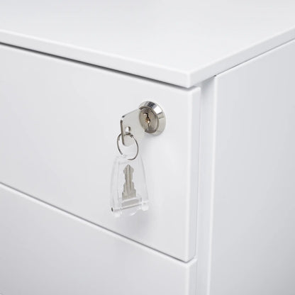 Close-up of a key inside a white cabinet with a keyhole.